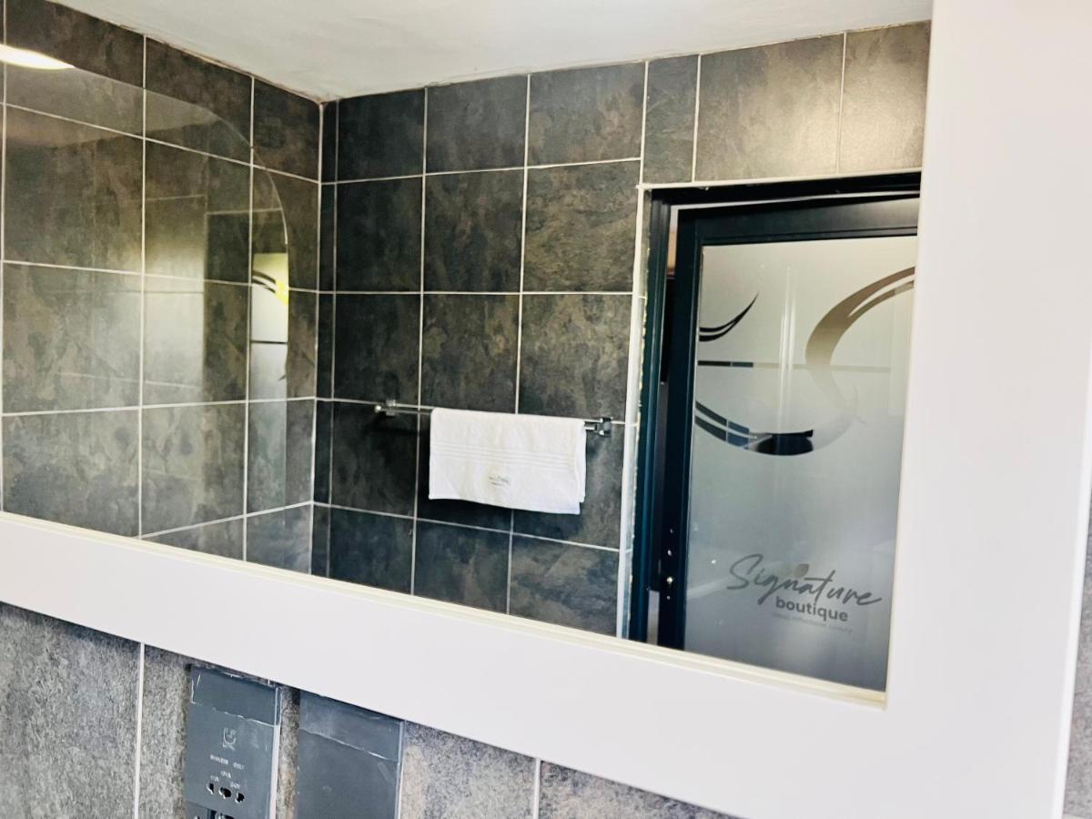 Signature Boutique Guesthouse Маун Экстерьер фото