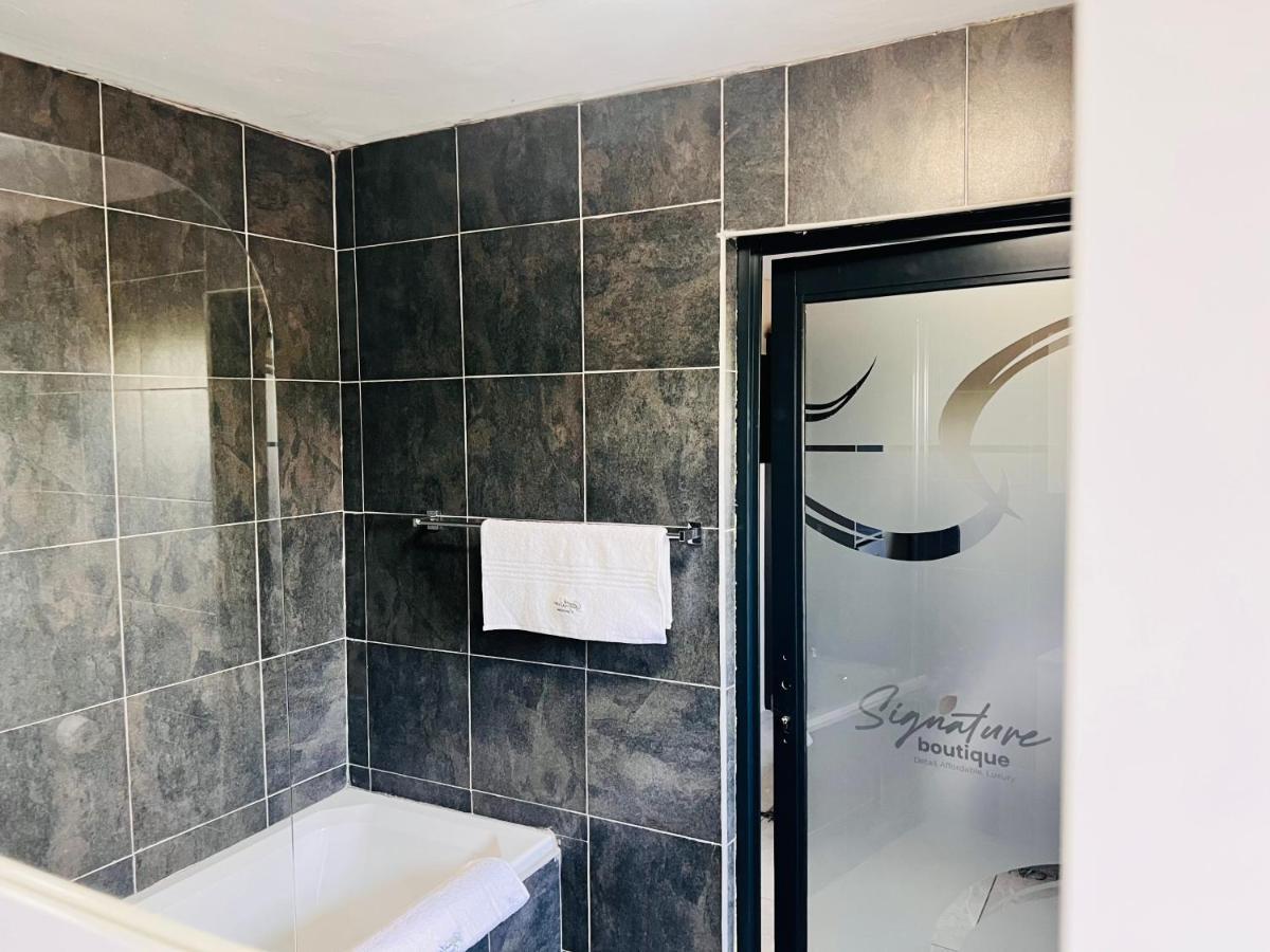 Signature Boutique Guesthouse Маун Экстерьер фото