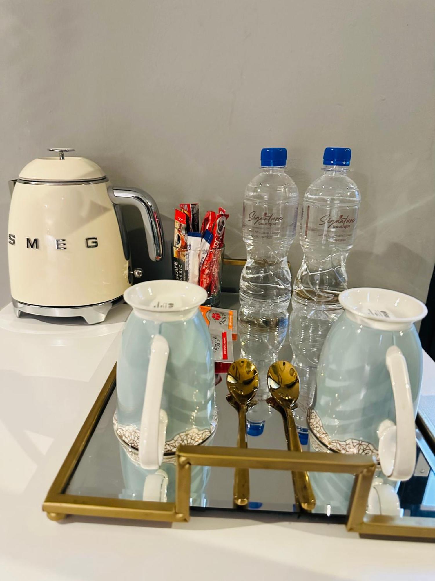 Signature Boutique Guesthouse Маун Экстерьер фото